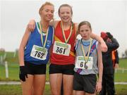 22 November 2009; Ulster's Elaine Burch who won the Girl's Under 16 Cross Country race with 2nd place Clare's Amy O'Donoghue, left, and 3rd place Dublin's Sophia O'Cleirigh-Buttner, right. Woodie’s DIY/AAI Inter County and Juvenile Even Ages Cross Country, Kilbeggan Race Course, Westmeath. Photo by Sportsfile
