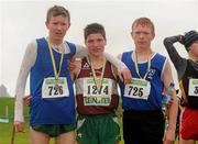 22 November 2009; Westmeath's Shane Fitzsomons who won the Boy's Under 16 Cross Country race with 2nd place  Tipperary's Sean Tobin, right and 3rd place Cork's Ian Hartnett, left. Woodie’s DIY/AAI Inter County and Juvenile Even Ages Cross Country, Kilbeggan Race Course, Westmeath. Photo by Sportsfile