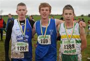 22 November 2009; Cork's Patrick Coleman who won the Boy's Under 18 Cross Country race with 2nd place Laois' Stephen Attride, right, and Leinster's Liam Brady, left. Woodie’s DIY/AAI Inter County and Juvenile Even Ages Cross Country, Kilbeggan Race Course, Westmeath. Photo by Sportsfile