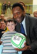 26 November 2009; Ronan Maher, aged 8, from Co. Kilkenny, with Pelé during a visit to Our Lady's Children's Hospital, Crumlin, Dublin. Picture credit: Pat Murphy / SPORTSFILE