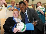 26 November 2009; Aaron Lambert, aged 11, from Co. Dublin, with Pelé during a visit to Our Lady's Children's Hospital, Crumlin, Dublin. Picture credit: Pat Murphy / SPORTSFILE