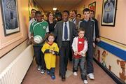 26 November 2009; Pelé is escorted through the hospital by, from left to right, Idris Afolobi, age 18, from Co. Kildare, Adam McGovern, age 9, from Co. Dublin, Devon Behan, age 12, from Co. Kildare, and David Feeney, age 14, from Co. Roscommon, during a visit to Our Lady's Children's Hospital, Crumlin, Dublin. Picture credit: Pat Murphy / SPORTSFILE
