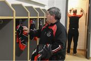 6 February 2016; Oulart the Ballagh kitman Tommy Davitt prepares the team jerseys in the dressing room before the game. AIB GAA Hurling Senior Club Championship, Semi-Final, Oulart the Ballagh v Na Piarsaigh. Semple Stadium, Thurles, Co. Tipperary. Picture credit: Diarmuid Greene / SPORTSFILE