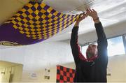 6 February 2016; Oulart the Ballagh physical trainer Ray Harris fixes a Wexford flag to the the dressing room ceiling before the game. AIB GAA Hurling Senior Club Championship, Semi-Final, Oulart the Ballagh v Na Piarsaigh. Semple Stadium, Thurles, Co. Tipperary. Picture credit: Diarmuid Greene / SPORTSFILE
