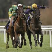 6 February 2016; Blazer, with Barry Geraghty up, on their way to winning the 1888 Restaurant Handicap Hurdle from second place Mighty Concord with Bryan Cooper and third place Joshua Lane with Mark Walsh. Horse Racing from Leopardstown. Leopardstown, Co. Dublin. Picture credit: Matt Browne / SPORTSFILE