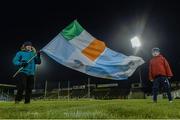 6 February 2016; Na Piarsaigh supporters Seoirse Laffan, left, and 7-year-old Oscar Fitgerald with a large flag after the game. AIB GAA Hurling Senior Club Championship, Semi-Final, Oulart the Ballagh v Na Piarsaigh. Semple Stadium, Thurles, Co. Tipperary. Picture credit: Diarmuid Greene / SPORTSFILE