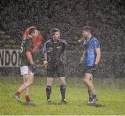 6 February 2016; Referee Padraig Hughes speaks to both Mayo's Colm Boyle and Dublin's John Small before issuing both with a second yellow card in the dying seconds of the game. Allianz Football League, Division 1, Round 2, Mayo v Dublin. Elverys MacHale Park, Castlebar, Co. Mayo. Picture credit: Ray McManus / SPORTSFILE