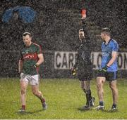 6 February 2016; Referee Padraig Hughes issues a red card, second yellow, to both Mayo's Colm Boyle and Dublin's John Small in the dying seconds of the game. Allianz Football League, Division 1, Round 2, Mayo v Dublin. Elverys MacHale Park, Castlebar, Co. Mayo. Picture credit: Ray McManus / SPORTSFILE