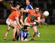 6 February 2016; Gareth Dillon, Laois, in action against Stefan Forker and Gavin McParland. Armagh. Allianz Football League, Division 2, Round 2, Armagh v Laois. Athletic Grounds, Armagh. Picture credit: Oliver McVeigh / SPORTSFILE