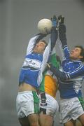 28 November 2009; Aidan Fennelly and Eoin Bland, Portlaoise, in action against Thomas Deehan, Clara. AIB GAA Football Leinster Club Senior Championship Semi-Final Re-Fixture, Portlaoise v Clara, O'Moore Park, Portlaoise. Picture credit: Matt Browne / SPORTSFILE