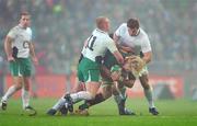 28 November 2009; Dewald Potgieter, South Africa, is tackled by Keith Earls, left, Cian Healy and Brian O'Driscoll, Ireland. Autumn International Guinness Series 2009, Ireland v South Africa, Croke Park, Dublin. Picture credit: Brendan Moran / SPORTSFILE