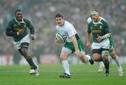 28 November 2009; Brian O'Driscoll, Ireland, breaks away from South Africa. Autumn International Guinness Series 2009, Ireland v South Africa, Croke Park, Dublin. Picture credit: Stephen McCarthy / SPORTSFILE
