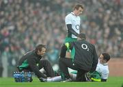 28 November 2009; Paddy Wallace, Ireland, is attended to by team physiotherapist Cameron Steele and Dr. Michael Webb, right. Autumn International Guinness Series 2009, Ireland v South Africa, Croke Park, Dublin. Picture credit: Stephen McCarthy / SPORTSFILE