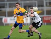 29 November 2009; Paul McGoldrick, St. Teresa's, in action against Ciaran Connolly, Emyvale. AIB GAA Football Ulster Club Junior Championship Final, Emyvale v St. Teresa's, Páirc Esler, Newry. Picture credit: Oliver McVeigh / SPORTSFILE
