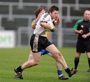 29 November 2009; John T Treanor, Emyvale, in action against Philip Maguire, St. Teresa's. AIB GAA Football Ulster Club Junior Championship Final, Emyvale v St. Teresa's, Páirc Esler, Newry. Picture credit: Oliver McVeigh / SPORTSFILE