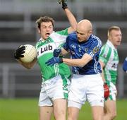 29 November 2009; Paul McFlynn, Loup, in action against Anthony Healy, St. Gall's. AIB GAA Football Ulster Club Senior Championship Final, St. Gall's v Loup, Páirc Esler, Newry, Co. Down. Picture credit: Oliver McVeigh / SPORTSFILE