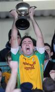 29 November 2009; Corofin captain Kieran Comer lifts the cup at the end of the game. AIB GAA Football Connacht Club Senior Football Championship Final, Charlestown v Corofin, Charlestown, Co. Mayo. Picture credit: Ray Ryan / SPORTSFILE
