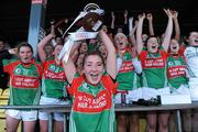 29 November 2009; Beulah McManus, Clonakilty, lifts the cup after the win against Drumcliffe/Rosses Point. Tesco All-Ireland Ladies Junior Club Championship Final, Clonakilty v Drumcliffe/Rosses Point, Dr. Cullen Park, Carlow. Picture credit: Matt Browne / SPORTSFILE