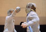 29 November 2009; Owen McNamee, Ireland, left, in action against Matthieu Francois-Dainville, France, during the Men's Individual Sabre competition. McNamee went on to win the competition. Irish Open Fencing Championships, DCU, Dublin. Picture credit: Brian Lawless / SPORTSFILE
