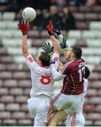 7 February 2016; Colm Cavanagh and Cathal McCarron, Tyrone, in action against Damien Comer, Galway.  Allianz Football League, Division 2, Round 2, Galway v Tyrone. Pearse Stadium, Galway. Picture credit: Matt Browne / SPORTSFILE