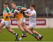 7 February 2016; Jason Gettings, Offaly, in action against Kevin Feely, Kildare. Allianz Football League, Division 3, Round 2, Kildare v Offaly. St Conleth's Park, Newbridge, Co. Kildare. Photo by Sportsfile