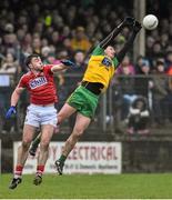 7 February 2016; Hugh McFadden, Donegal, in action against Peter Kelleher, Cork. Allianz Football League, Division 1, Round 2, Donegal v Cork. Fr. Tierney Park, Ballyshannon, Co. Donegal. Picture credit: David Maher / SPORTSFILE