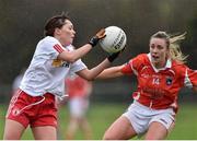 7 February 2016; Karen Quinn, Tyrone, in action against Sinead Finnegan, Armagh. Lidl Ladies Football National League Division 1, Tyrone v Armagh. Drumquin, Tyrone. Picture credit: Oliver McVeigh / SPORTSFILE