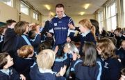 1 December 2009; All-Ireland winning captain and Ulster Bank employee Darran O'Sullivan, Kerry, is greeted by delighted school children from Scoil San Treasa. The Ulster Bank pair are visiting schools to celebrate their fantastic achievement and promote GAA with primary and secondary school children. Scoil San Treasa, Mount Merrion, Co. Dublin. Picture credit: Stephen McCarthy / SPORTSFILE