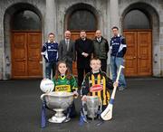 1 December 2009; All-Ireland winning captains and Ulster Bank employees Michael Fennelly, Kilkenny, right, and Darran O’Sullivan, Kerry, left, with Scoil San Treasa Príomhoide Proinsias ÓhÓgáin, Sean Healy, Managing Director Sales Business Banking, Ulster Bank, centre, and Sean Gallagher, Chief Executive of Corporate Markets, Ulster Bank, right, are pictured with Scoil San Treasa pupils Jake Daly, age 11, from 6th class, right, and Kim Healy, age 11, from 5th class, during a visit to their school. The Ulster Bank pair are visiting schools to celebrate their fantastic achievement and promote GAA with primary and secondary school children. Scoil San Treasa, Mount Merrion, Co. Dublin. Picture credit: Stephen McCarthy / SPORTSFILE