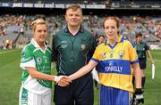 27 September 2009; Fermanagh captain Kyla McManus shakes hands with Clare captain Louise Henchy in the company of referee Joe Murray. TG4 All-Ireland Ladies Football Intermediate Championship Final, Clare v Fermanagh, Croke Park, Dublin. Picture credit: Ray McManus / SPORTSFILE