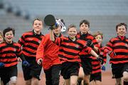 2 December 2009; Nathan Benson and his team-mates, Scoil Cholmcille, Knocklyon, celebrate with the cup. Allianz Cumann na mBunscol Dublin Finals, Corn Kitterick, Scoil Cholmcille, Knocklyon v Belgrove Senior Boys, Croke Park, Dublin. Picture credit: Brian Lawless / SPORTSFILE