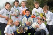 3 December 2009; Jonathan Sexton shows he has the Fit Factor as he joins children from St Olaf's NS in Dundrum, from left, Liam Kelly, Lara Ellison, Clara O'Sullivan, Donagh Humphries, Jack Nagle, Andrew Blackwood, Eva O'Mahony and Jack Chester to launch the Irish Heart Foundation's new school programme in conjunction with Lidl. Visit www.fitfactor.ie for more info. St. Olaf's National School, Balally Drive, Dundrum, Dublin. Picture credit: Pat Murphy / SPORTSFILE