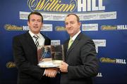 3 December 2009; Cork hurler Donal Og Cusack, left, receives his award from David Hood, Public Relations Director with Williamhill.com, after Cusack's autobiography &quot;Come What May&quot; was announced as the winner of the 2009 Williamhill.com Irish Sports Book of the Year. William Hill Bookmakers, Dame Street, Dublin. Picture credit: Matt Browne / SPORTSFILE