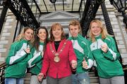 4 December 2009; Lord Mayor of Dublin Emer Costello with members of the Irish Cross Country Team, from left, Dundrum South Dublin AC's Linda Byrne, Bryony Treston, and Brendan O'Neill with Raheny Shamrocks AC's Orla O'Mahony, who were invited to the Mansion House this morning ahead of the Spar European Cross Country Championships which take place in Santry Park, Dublin on December 13th. More information on www.dublin2009.ie. Mansion House, Dawson Street, Dublin. Picture credit: Brian Lawless / SPORTSFILE