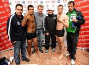 4 December 2009; European Middleweight Champion Matthew Macklin, right, and Rafa Sosa Pintos during the weigh-in ahead tomorrow's Sierra Fight Night, at the National Stadium, with, from left, Sebastian Amaya, manager, Brian Peters, promoter, Ricky Hatton and Joe Gallagher, trainer. Matthew Macklin and Rafa Sosa Pintos Weigh-In, Ballsbridge Inn, Ballsbridge, Dublin. Picture credit: Stephen McCarthy / SPORTSFILE