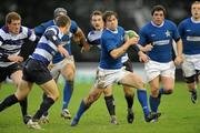 5 December 2009; Cormac Quinn, St Mary's College, tries to avoid the tackle of David Moore, Blackrock College. AIB League Division 1, St Mary's College v Blackrock College, Templeville Road, Dublin. Picture credit: Matt Browne / SPORTSFILE