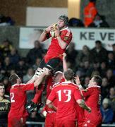 5 December 2009; Donnacha Ryan, Munster, takes the ball in the lineout. Celtic League, Ospreys v Munster, Liberty Stadium, Swansea, Wales. Picture credit: Steve Pope / SPORTSFILE