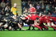 5 December 2009; The Ospreys and Munster packs scrum down during the game. Celtic League, Ospreys v Munster, Liberty Stadium, Swansea, Wales. Picture credit: Steve Pope / SPORTSFILE