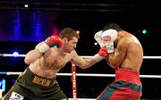 5 December 2009; Matthew Macklin in action against Rafa Sosa Pintos during the first round of their Sierra Fight Night bout. Sierra Fight Night, Matthew Macklin v Rafa Sosa Pintos. National Stadium, Dublin. Picture credit: Stephen McCarthy / SPORTSFILE