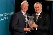 5 December 2009; Referee John Guinan, left, from County Westmeath, who was a referee from 1990 - 2007, is presented with his retiree award by Uachtarán CLG Criostóir Ó Cuana. National Referee Awards Banquet 2009, Croke Park, Dublin. Photo by Sportsfile