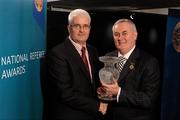 5 December 2009; Referee John Bannon, left, from County Longford, who was a referee from 1991 - 2009, is presented with his retiree award by Uachtarán CLG Criostóir Ó Cuana. National Referee Awards Banquet 2009, Croke Park, Dublin. Photo by Sportsfile