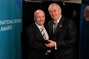 5 December 2009; Referee Marty Duffy, left, from County Sligo, who refereed the Senior All-Ireland Final and NFL Division Final is presented with his All-Ireland Referee's award by Uachtarán CLG Criostóir Ó Cuana. National Referee Awards Banquet 2009, Croke Park, Dublin. Photo by Sportsfile