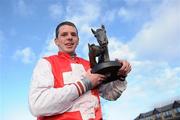 6 December 2009; Jockey Alain Cawley with the winners troply after winning the John Durkan Memorial Punchestown Steeplechase with Joncol. Punchestown Racecourse, Co. Kildare. Picture credit: Matt Browne / SPORTSFILE
