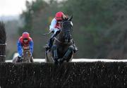6 December 2009; Joncol, with Alain Cawley up, jumps the last on their way to winning the John Durkan Memorial Punchestown Steeplechase. Punchestown Racecourse, Co. Kildare. Picture credit: Matt Browne / SPORTSFILE