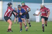 6 December 2009; Jill Horan, Cashel, in action against Kaherine Glynn, left, and Regina Glynn, Athenry. All-Ireland Senior Camogie Club Championship Final, Athenry, Galway v Cashel, Tipperary, Clarecastle GAA Club, Clarecastle, Co. Clare. Picture credit: Diarmuid Greene / SPORTSFILE