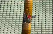 6 December 2009; Young supporters take up their seats ahead of the game. AIB GAA Football Munster Club Senior Championship Final, Kilmurray Ibrickane, Clare, v Kerins O'Rahilly's, Kerry. Gaelic Grounds, Limerick. Picture credit: Stephen McCarthy / SPORTSFILE