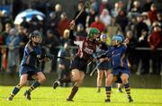 6 December 2009; Therese Maher, Athenry, in action against Philly Fogarty, left, and Julie McGrath, Cashel. All-Ireland Senior Camogie Club Championship Final, Athenry, Galway v Cashel, Tipperary, Clarecastle GAA Club, Clarecastle, Co. Clare. Picture credit: Diarmuid Greene / SPORTSFILE