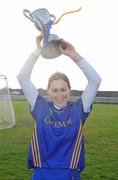 6 December 2009; Cashel captain Una Dwyer lifts the Bill Carroll Cup after victory over Athenry. All-Ireland Senior Camogie Club Championship Final, Athenry, Galway v Cashel, Tipperary, Clarecastle GAA Club, Clarecastle, Co. Clare. Picture credit: Diarmuid Greene / SPORTSFILE b