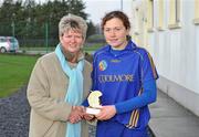 6 December 2009; Cashel's Claire Grogan is presented with the Player of the Match award by Joan O'Flynn, President of the Camogie Association. All-Ireland Senior Camogie Club Championship Final, Athenry, Galway v Cashel, Tipperary, Clarecastle GAA Club, Clarecastle, Co. Clare. Picture credit: Diarmuid Greene / SPORTSFILE