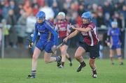 6 December 2009; Claire Grogan, Cashel, in action against Krystle Ruddy, Athenry. All-Ireland Senior Camogie Club Championship Final, Athenry, Galway v Cashel, Tipperary, Clarecastle GAA Club, Clarecastle, Co. Clare. Picture credit: Diarmuid Greene / SPORTSFILE